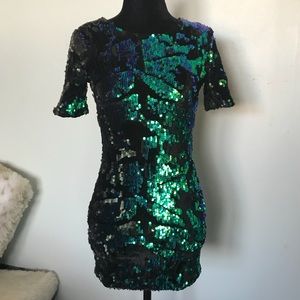 Black velvet dress with green iridescent sequins